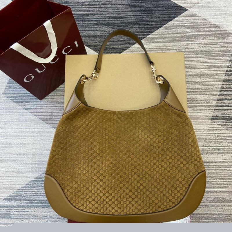 G*u*i top handle bags